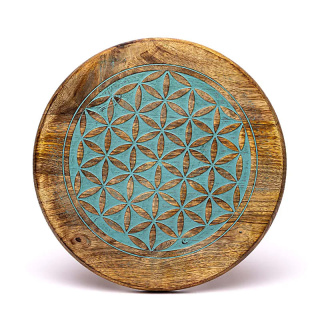 Drewniany stolik kawowy z niebieskim symbolem Kwiatu Życia